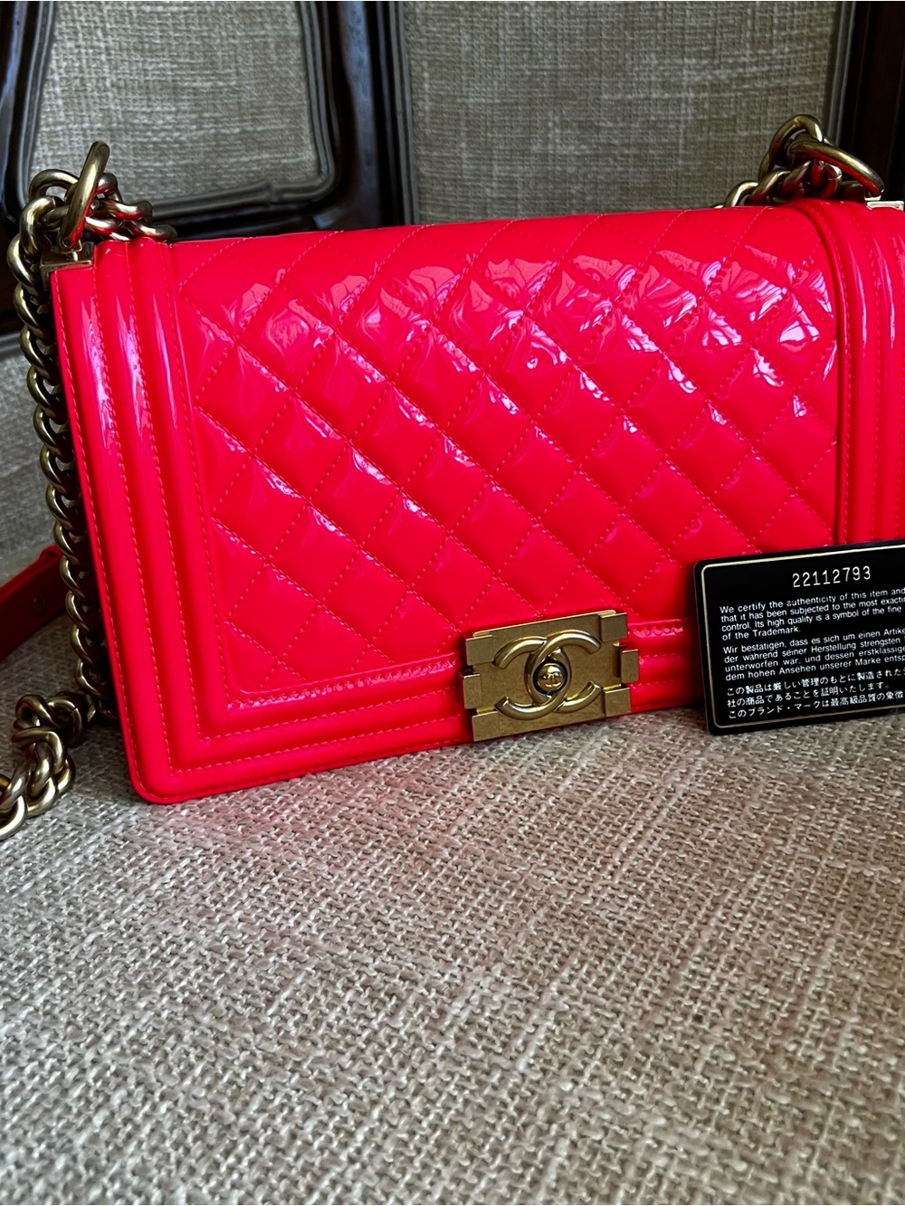 CHANEL Boy Quilted Patent Leather Crossbody in Neon Pink with Gold Hardware
